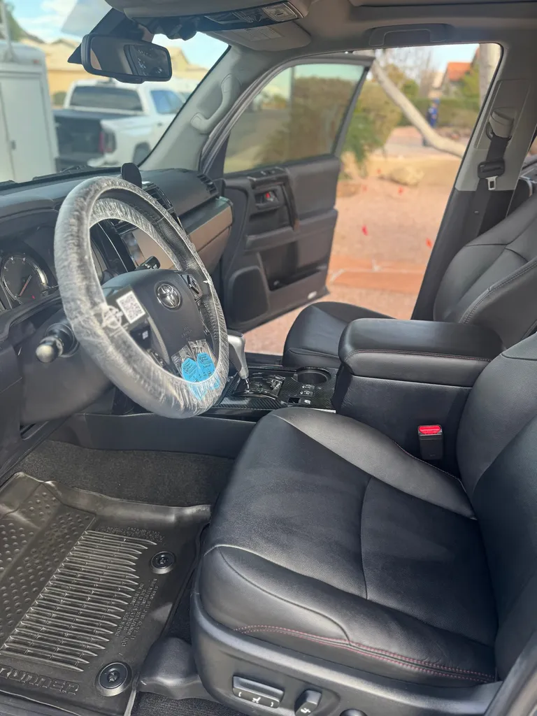 Detailed Toyota 4Runner interior with clean leather seats