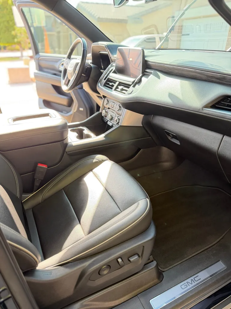 Spotless SUV interior with clean seats and console after a detail